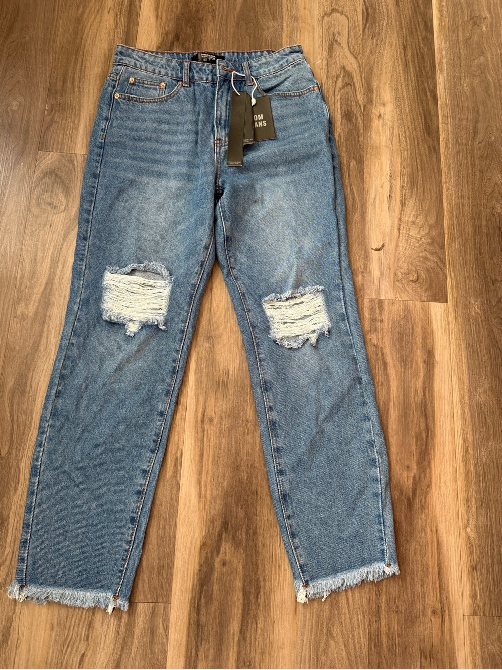 High-Rise Distressed Boyfriend Jeans in Light Blue